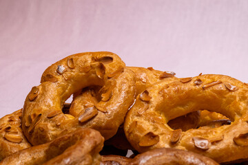 Almond doughnuts, homemade almond donuts. Homemade Spanish pastries with honey, butter and nuts.