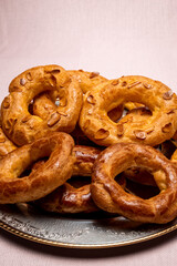 Almond doughnuts, homemade almond donuts. Homemade Spanish pastries with honey, butter and nuts.
