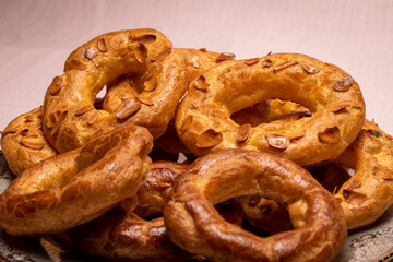 Almond doughnuts, homemade almond donuts. Homemade Spanish pastries with honey, butter and nuts.
