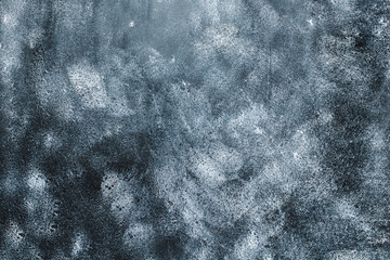 the black background is stained and aged. dirty concrete wall. place for text.