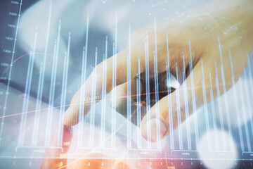 Multi exposure of man's hands holding and using a phone and financial chart drawing. Market analysis concept.