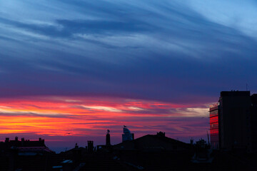 Fototapeta na wymiar Sunset background and silhouette buildings