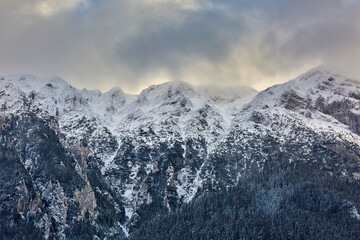 Winter landscape with rocky mountains