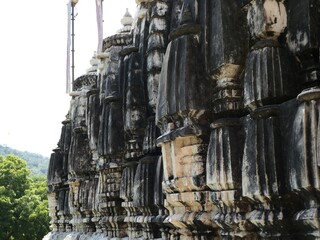 Ranakpur, Rajasthan, India, October 10, 2019: Jain Temple – The main outside wall is weathered...