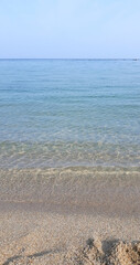 Soft beautiful ocean wave on sandy beach. Beach landscape.