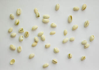 Pistachios isolated on white background, top view. 