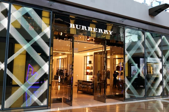 Exterior view of Burberry store in Marina Bay Sands mall. Burberry is a British luxury fashion house headquartered in London England. SINGAPORE APR 22 2018. Stock Photo Adobe Stock