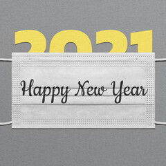 Happy New Year square card. The number 2021 looks out from under a medical mask. Postcard in trendy colors of the year.