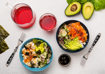 Hawaiian dish Poke salad with squid and salmon on a white background. Top view