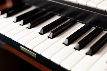 Simple pipe organ instrument keyboard closeup. Organ keys seen from up close, shallow depth of...