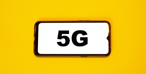 Smartphone with new 5G connectivity. Orange color 2021