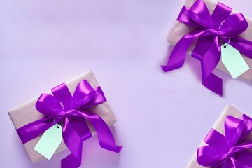 present gift boxes with lilac ribbon. Valentine's day, birthday present, international women day concept