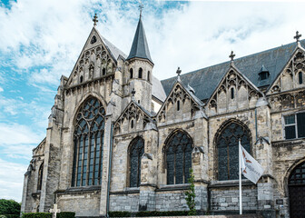 Fototapeta na wymiar The Saint Michaels church or Abbey Church of 'Thorn', Roman Catholic church from the 14th century. View of dutch white little town Thorn, province of Limburg, Netherlands