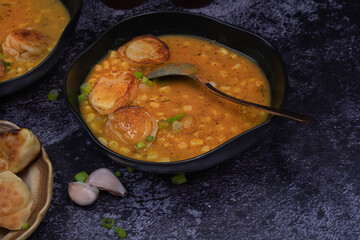 Creamy corn soup with ravioli dumplings