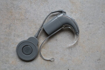 cochlea implant with fire alarm close up, therapy, hearing aid, hearing aid for deaf people to restore hearing, hearing disability trying to hear something © Sarah