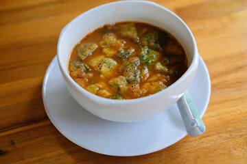 Sour curry soup with vegetable omelet