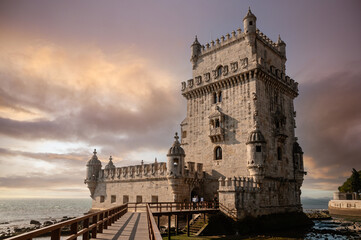 Fototapeta na wymiar Moody atmosphere at The Belem Tower (torre de Belém), Lisbon, Portugal. At the margins of the Tejo river, it is an iconic site of the city. Originally built as a defence tower, today is museum.
