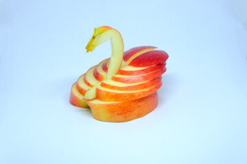 swan made of apple. Decoration made of fresh fruit