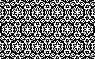 Ethnic stylish black and white pattern. Geometric background of flowers in traditional folk style for coloring, wallpaper, textiles.