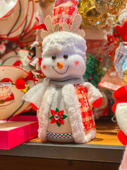 Lovely cuddly toy snow man in Christmas gift shop