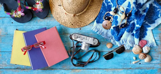 Gardinen vacation and summer holidays, flat lay with books, camera, flip flops, seashells, sunglasses, beach towel, straw hat © Kirsten Hinte
