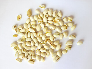 Pistachios isolated on white background, top view. 