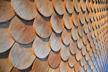 Full frame shot circular wooden shingles texture perspective background