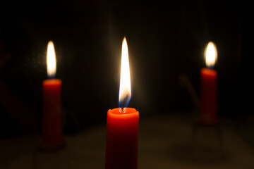 Three candles in the dark