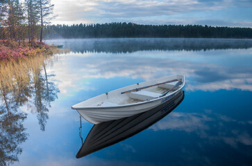 Boat on calm lake in Finland