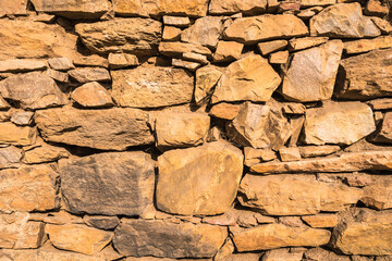 Patterns of old Stone wall background and texture