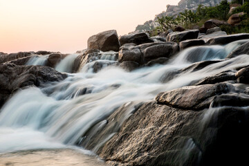 waterfall in the mountains at evening	
