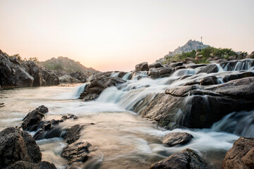 waterfall in the mountains at evening	
