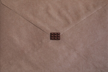 Kraft paper envelope. Handmade miniature polymer clay chocolate.