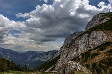 nice rocks and mountains with wide view and white clouds