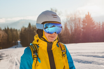 portrait of woman skier on the hill