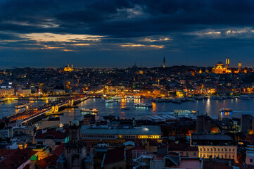Fototapeta na wymiar Night view of roofs of istanbul overlooking the Golden horn