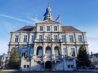 Cityhall in Maastricht town under blue sky