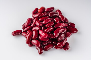 canned red kidney beans on a white acrylic background