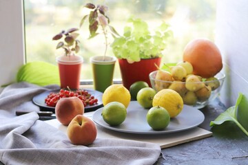 Fresh fruits and berries on the table, home cooking, organic food, healthy lifestyle