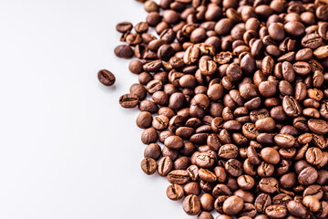 aromatic fresh coffee beans on a white acrylic background