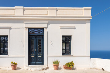 Fototapeta na wymiar View of the white villa. Typical Greek architecture. Folegandros Island, Greece.