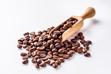 Obraz premium aromatic fresh coffee beans on a white acrylic background