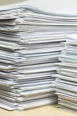 bundles bales of paper documents. stacks packs pile on the desk in the office