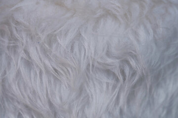 Fototapeta na wymiar Close-up white artificial fur texture