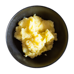 top view of mashed potatoes on black bowl cut out on white background