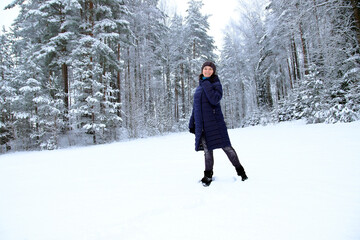 Portrait of a woman in winter in nature