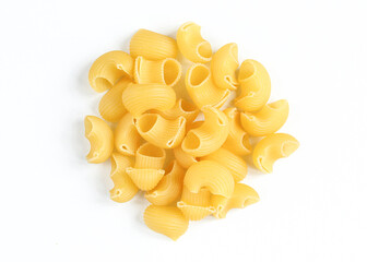 Portion of uncooked pasta snails isolated on white background. 
Dry Italian rigate dish