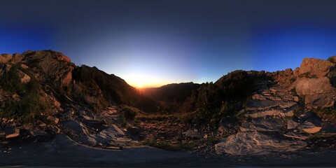 Spherical HDRI Panorama of sunrise in the mountains