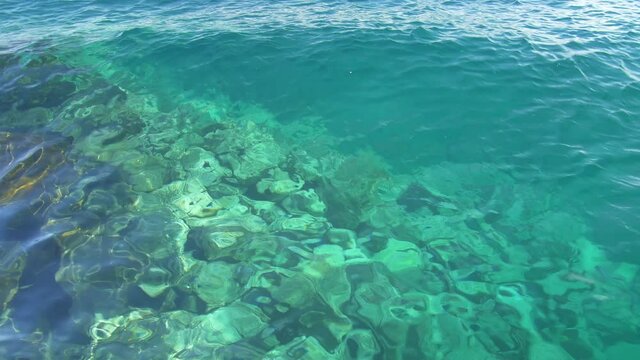 Clear water shoreline.