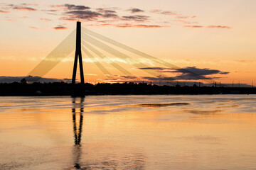 Beautiful sunset over the Vansu bridge in Riga, Latvia